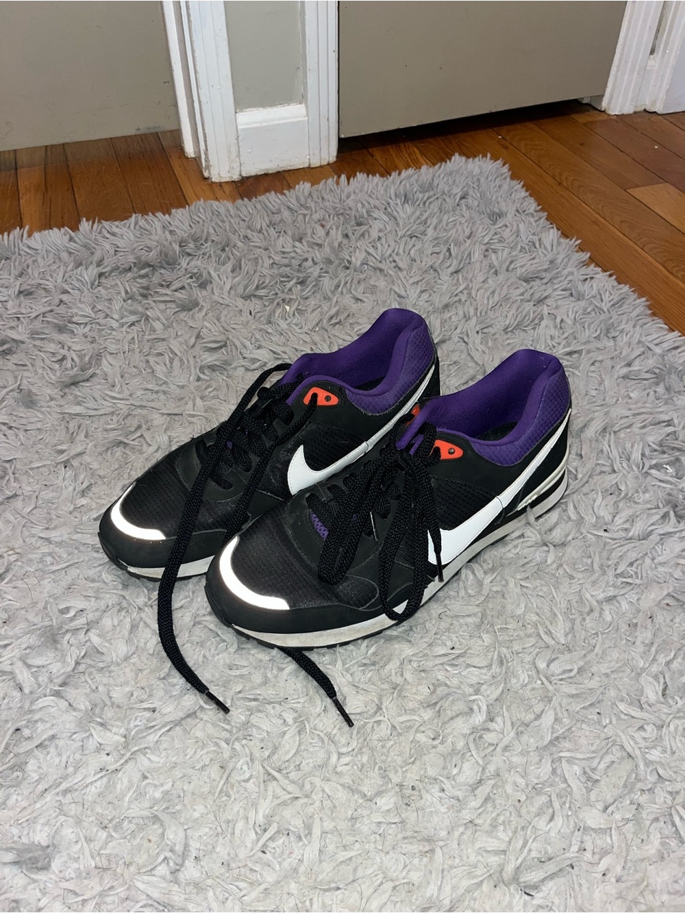 Nike Black Sneakers with Purple Lining and White Swoosh